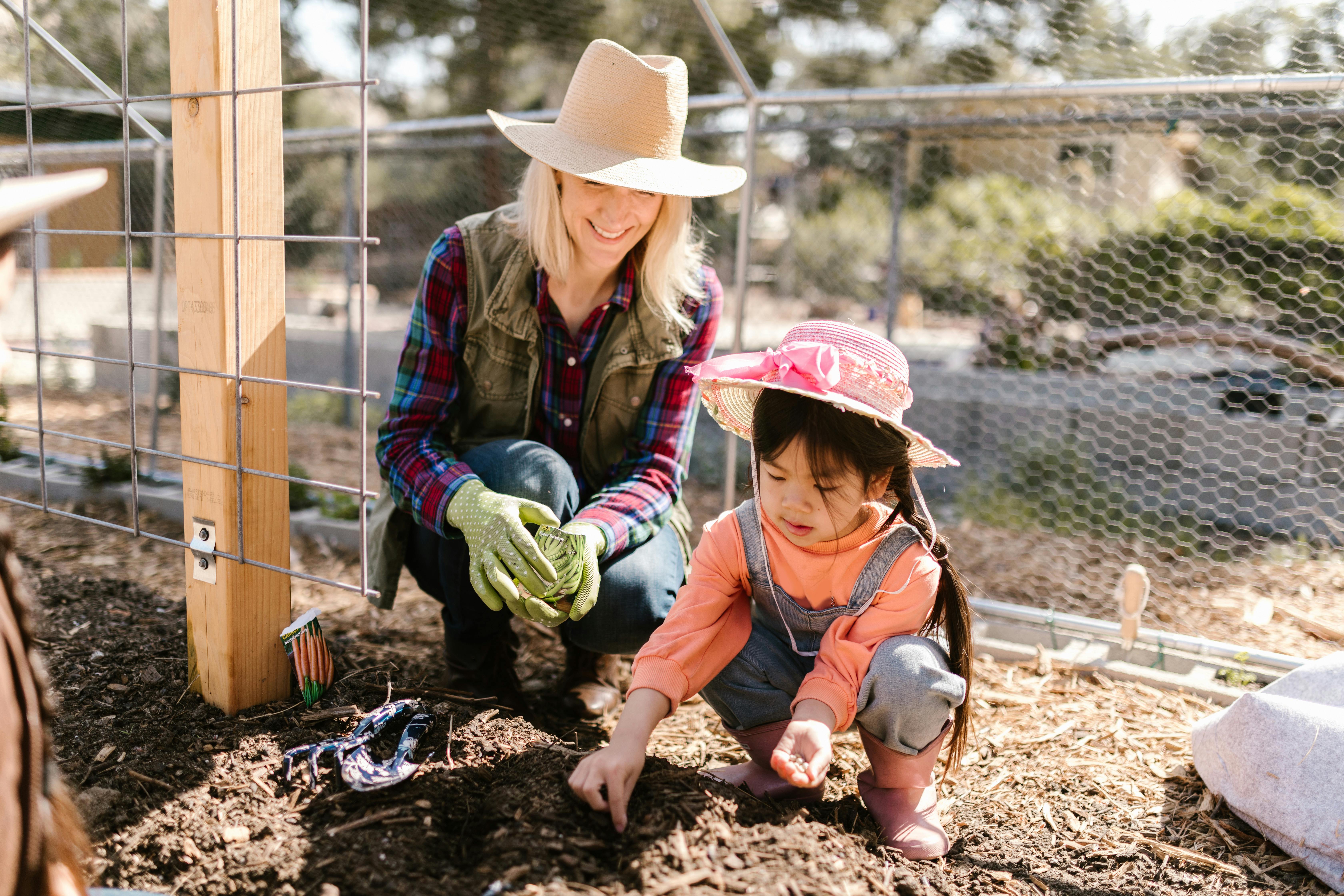 Woman and child gardening